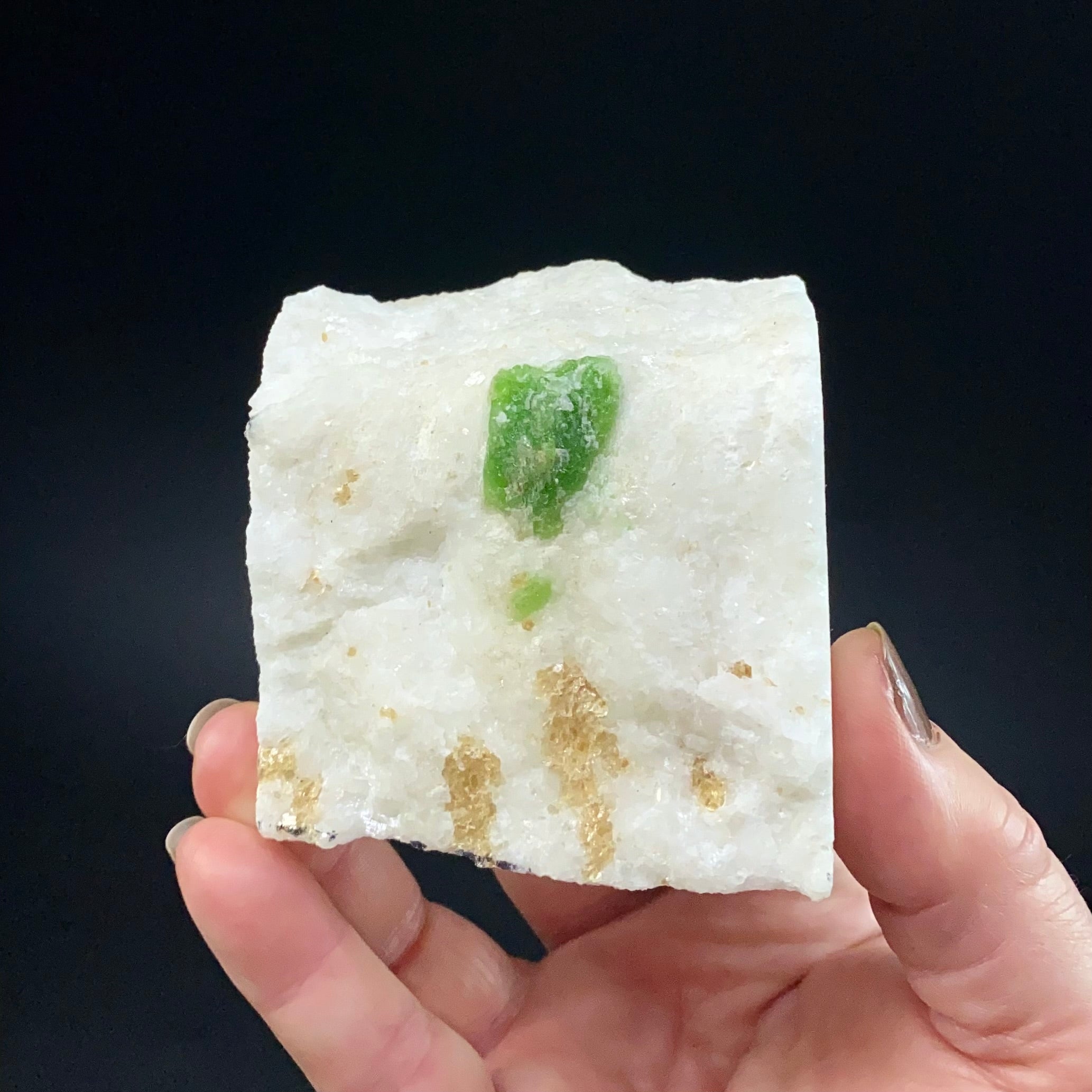 Green Pargasite Crystals with Phlogopite on Marble Matrix