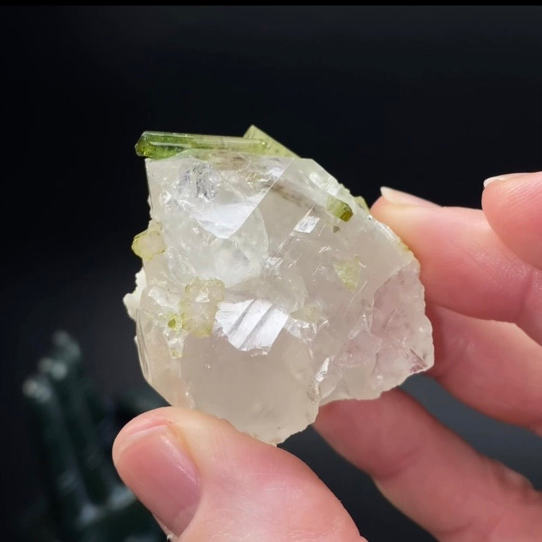 Bicolor Green Tourmaline Crystals on Clear Quartz Crystal