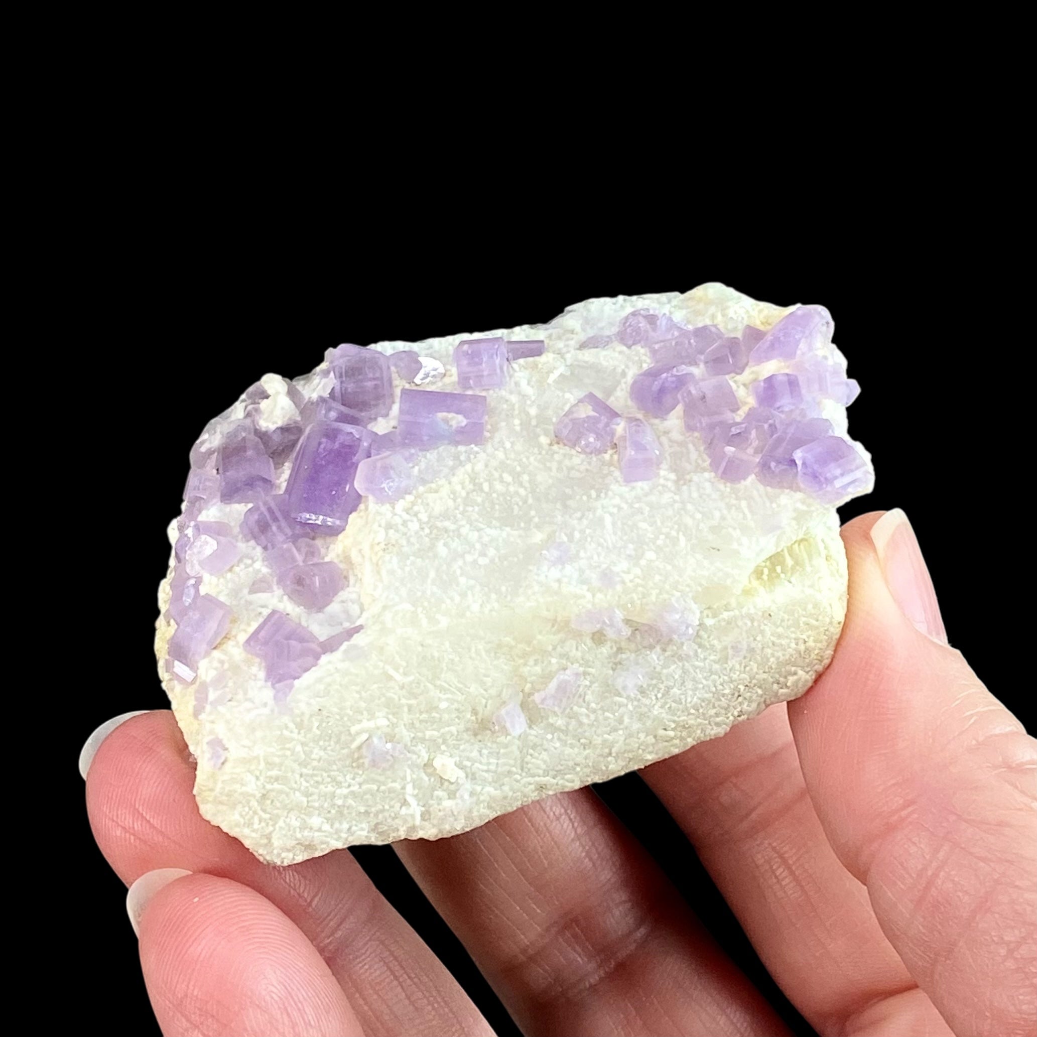 Fluorescent Lavender Apatite Crystals on Feldspar Matrix