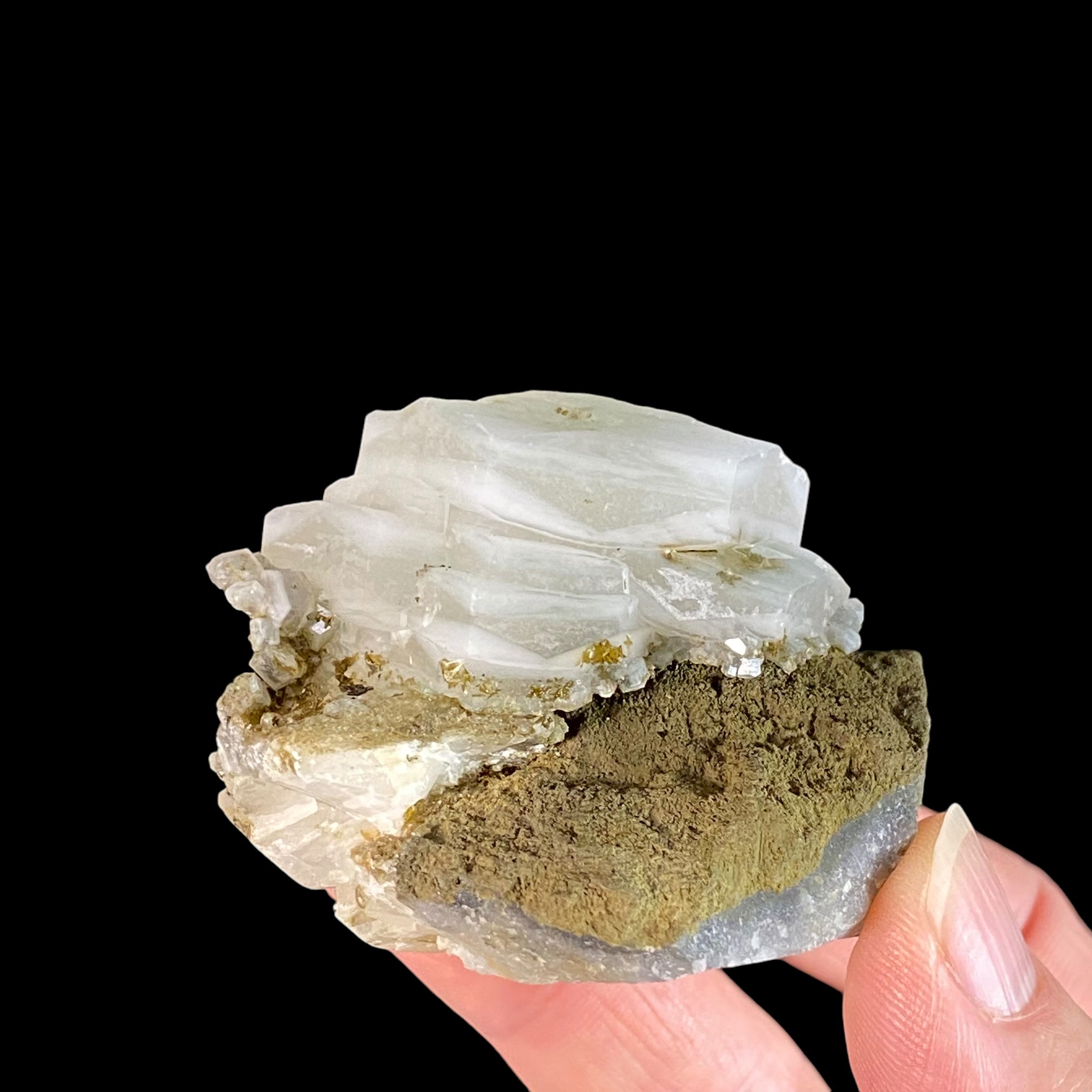 Fluorescent Hexagonal Sandwich Calcite Crystals with Hedenbergite on Matrix