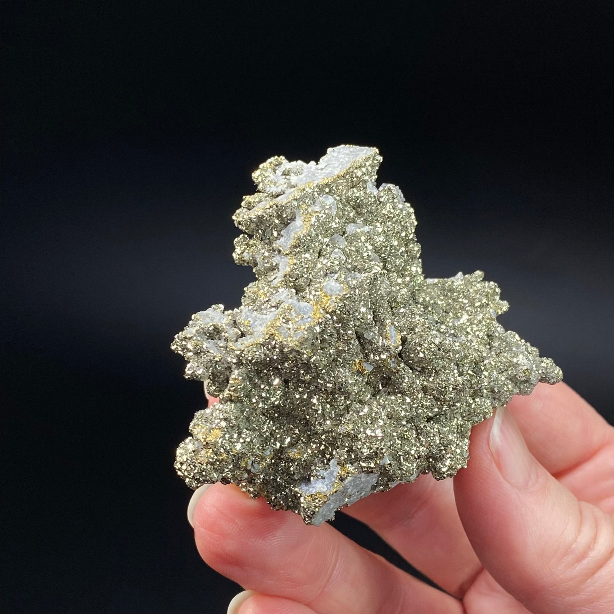 Druzy Cubic Pyrite Crystals over Fluorescent Calcite