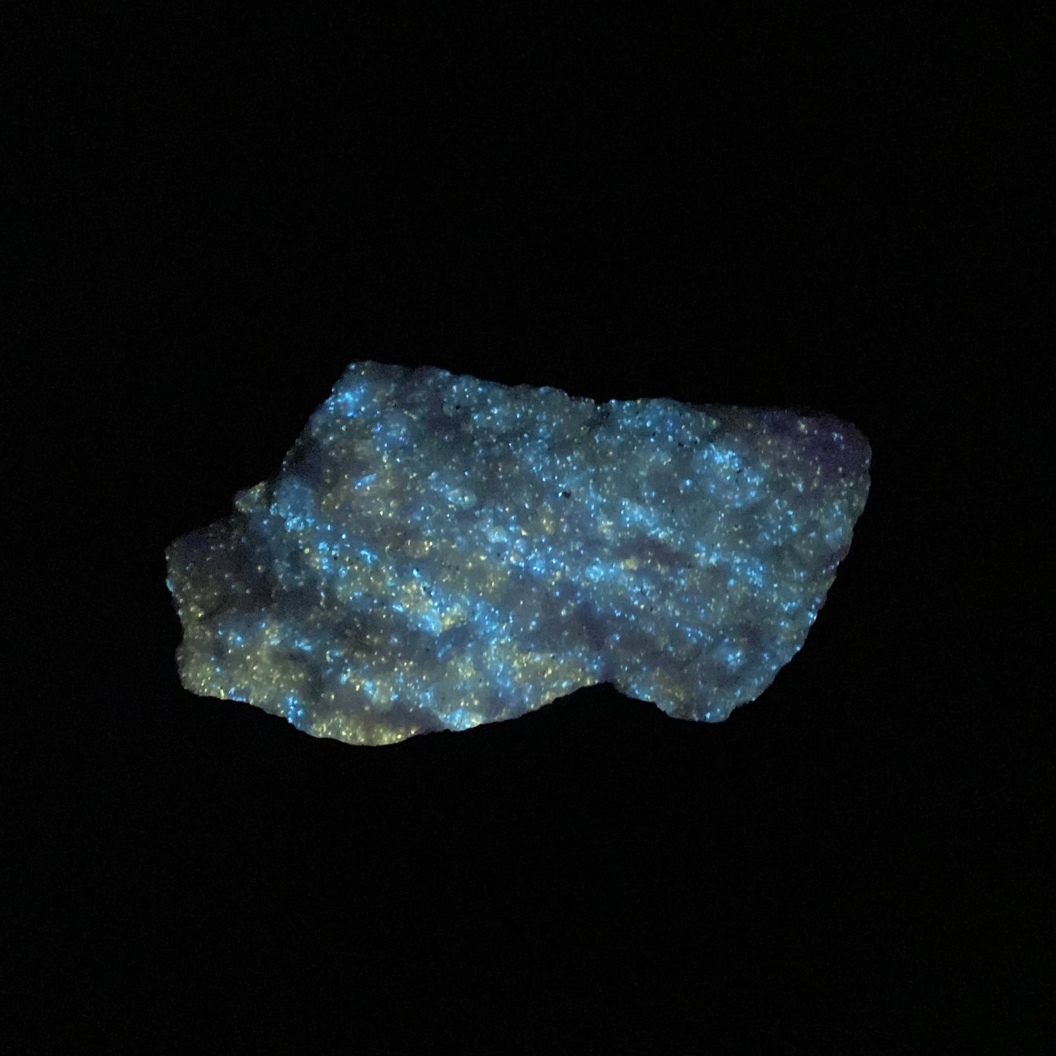 Fluorescent Wollastonite on Calcite, Nobel Pit, Sterling Hill Mine, New Jersey