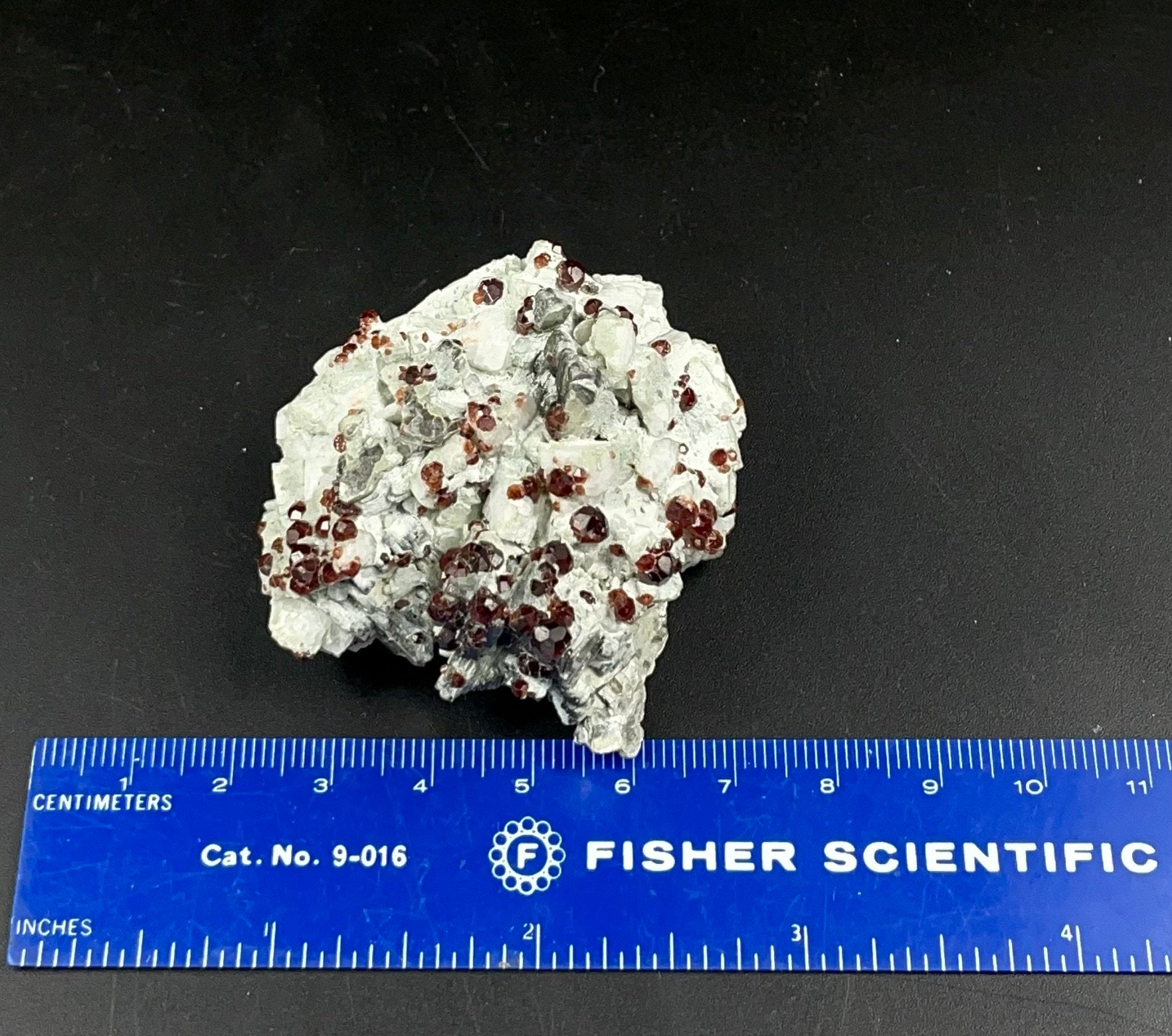 Reddish Orange Garnets on Albite Matrix with Mica and Quartz