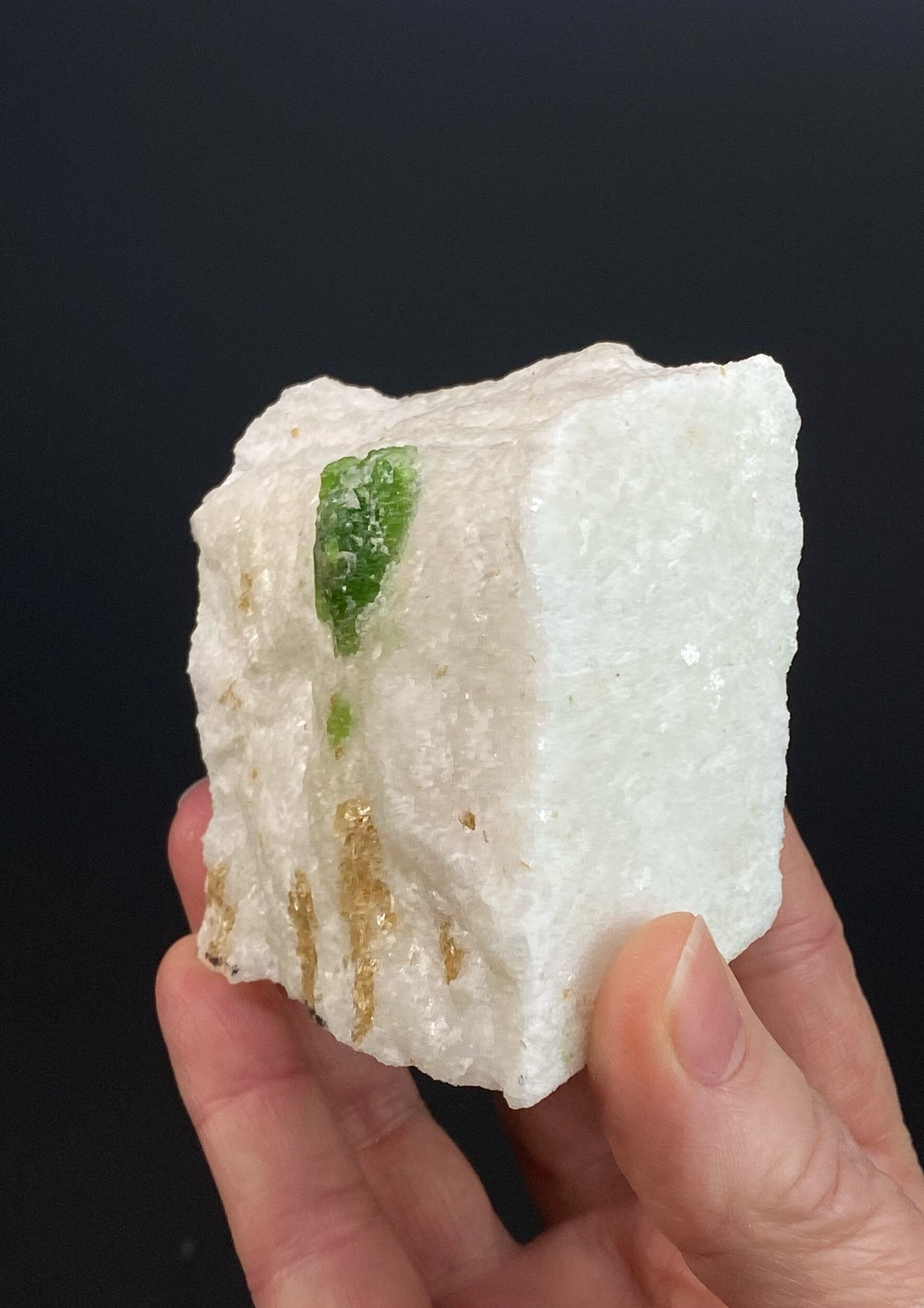 Green Pargasite Crystals with Phlogopite on Marble Matrix