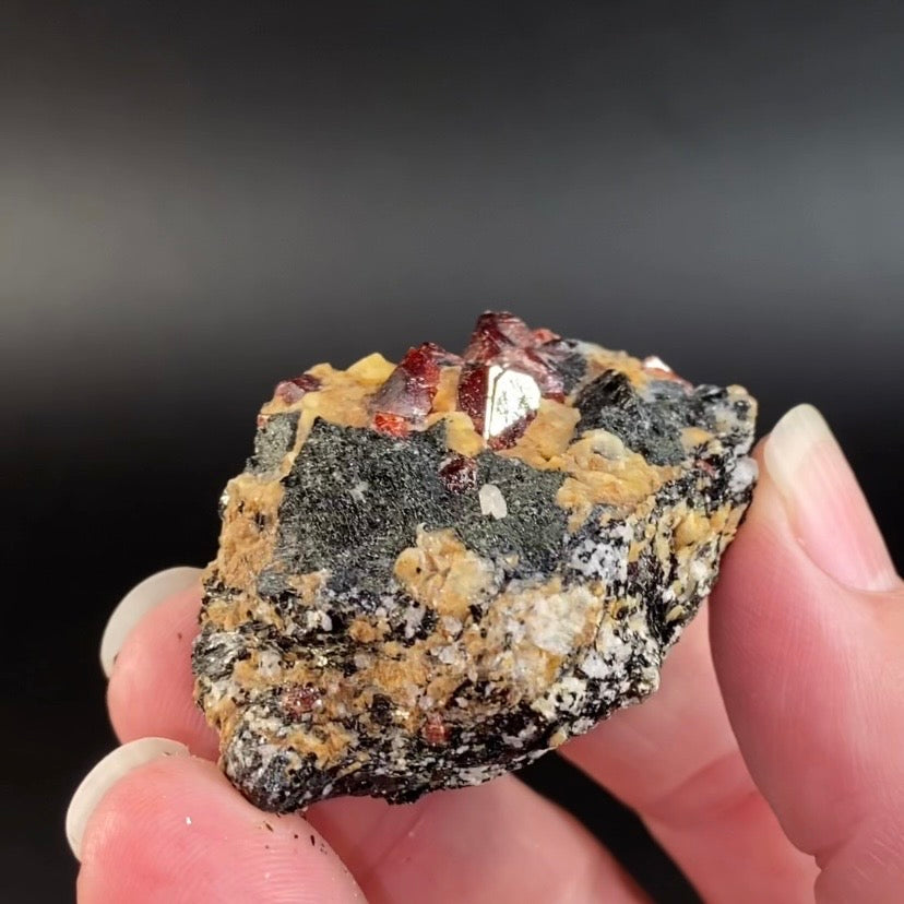 Zircon Crystal with Fluorescent Apatite Inclusions, Biotite-Calcite Aegirine matrix, Astore Valley, Pakistan