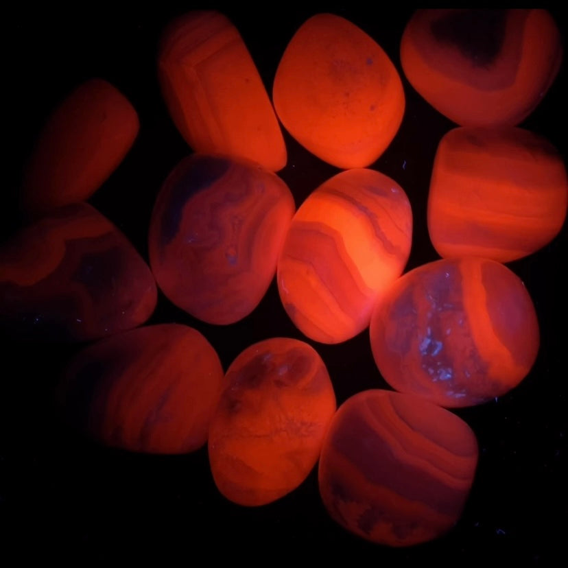 High Grade Light Pink Mangano Calcite Tumbled Stone from Peru, Fluorescent