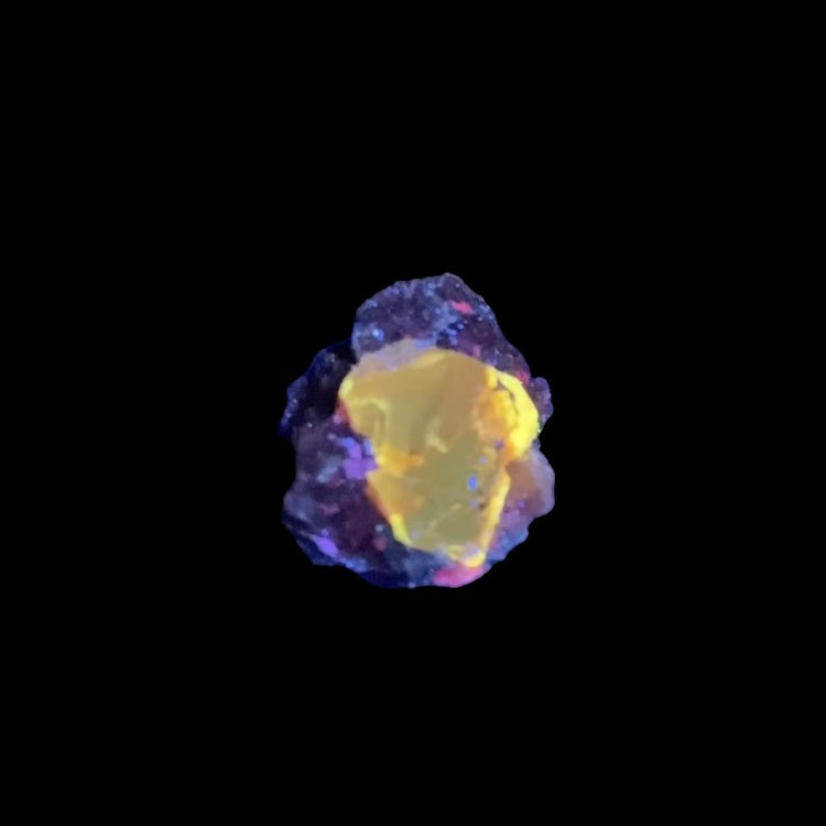 Zircon Crystal with Bright Yellow Fluorescent Apatite Inclusions on Matrix