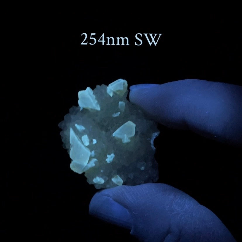 Phosphorescent Golden Feather Calcite Crystals on Druzy Quartz