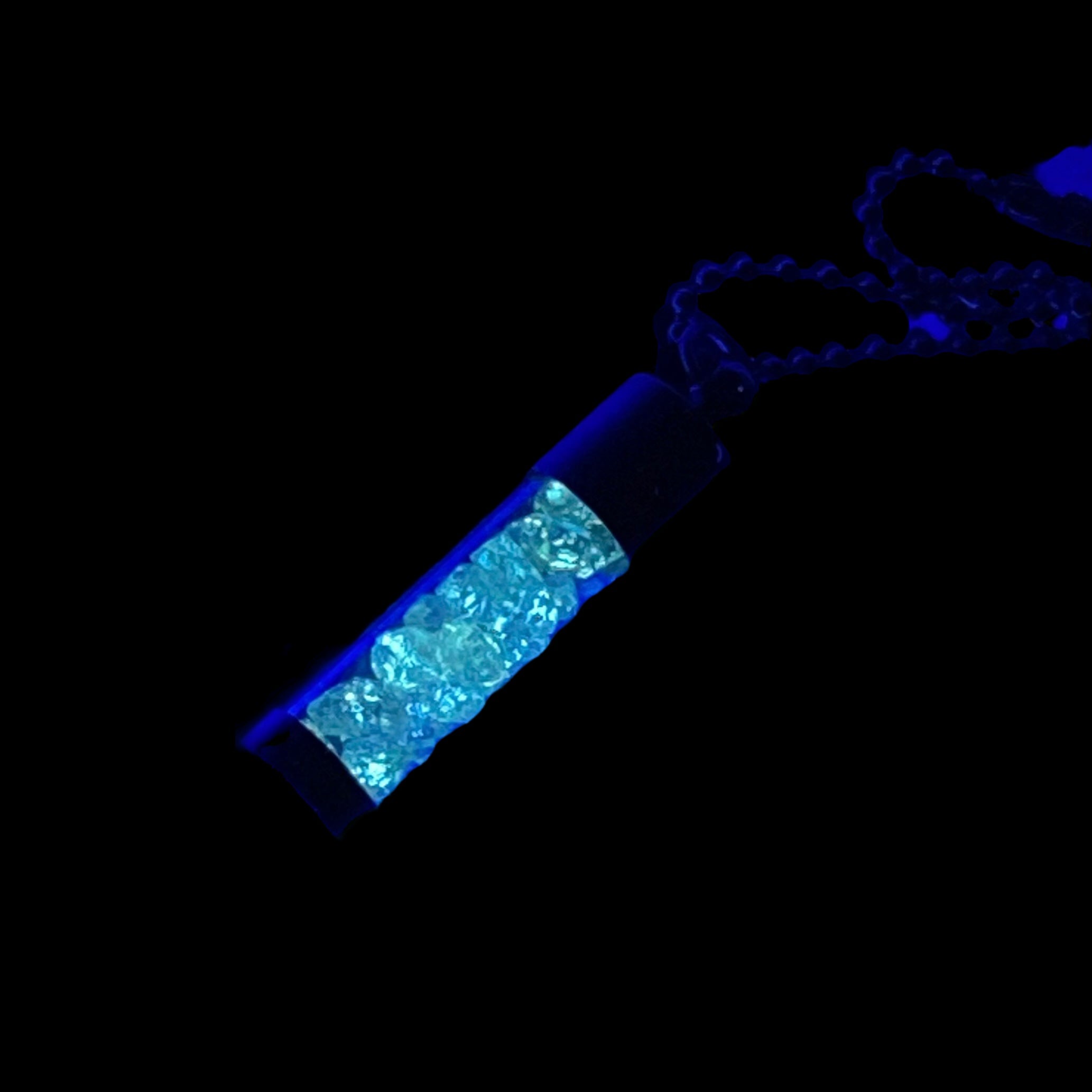 High Grade Fluorescent Double Terminated Petroleum Quartz Crystal Filled Pendant Necklace