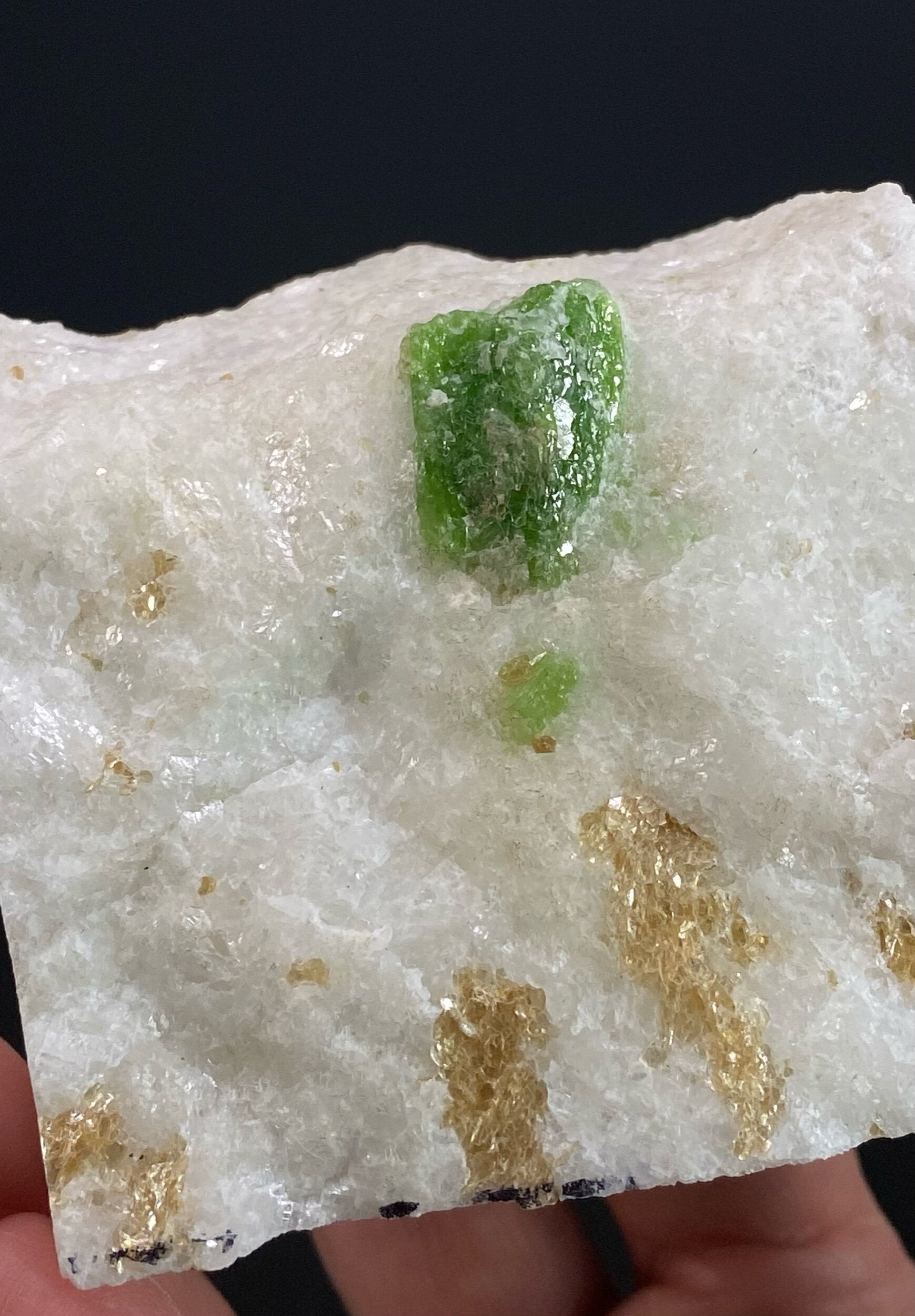 Green Pargasite Crystals with Phlogopite on Marble Matrix