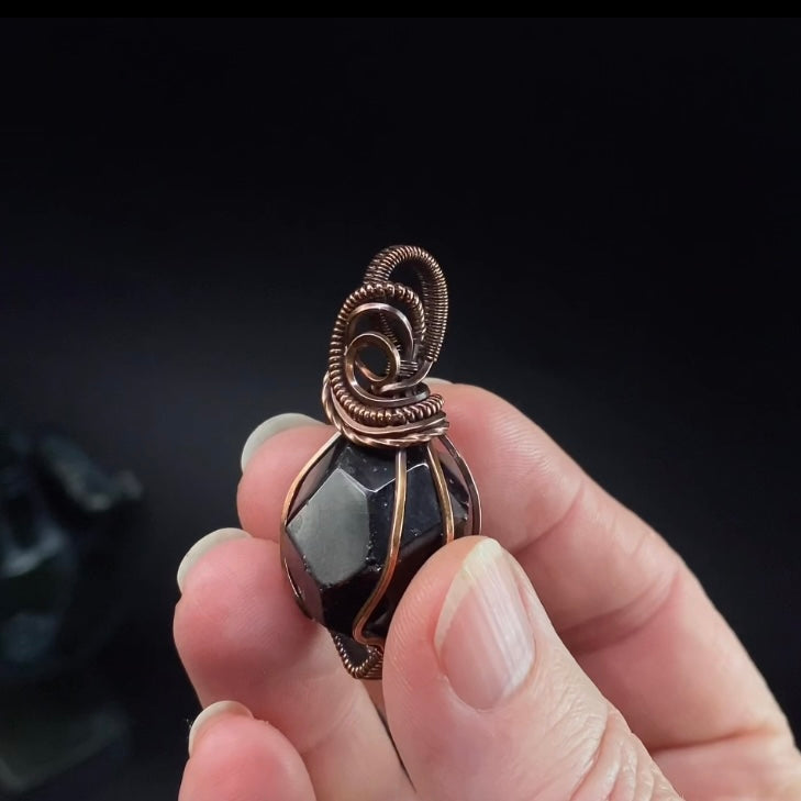 Polished Almandine Garnet and Copper Wire Wrapped Pendant