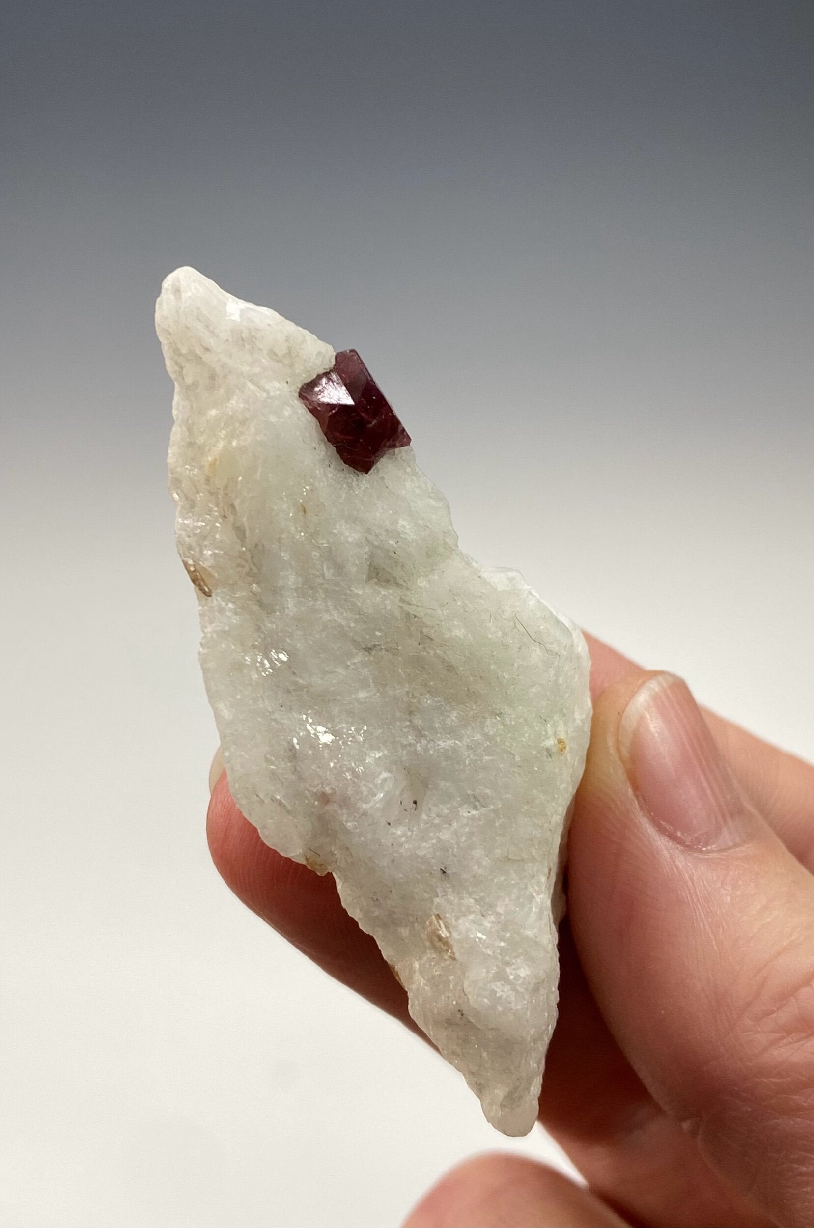 Red Twinned Spinel Crystal on Marble Matrix