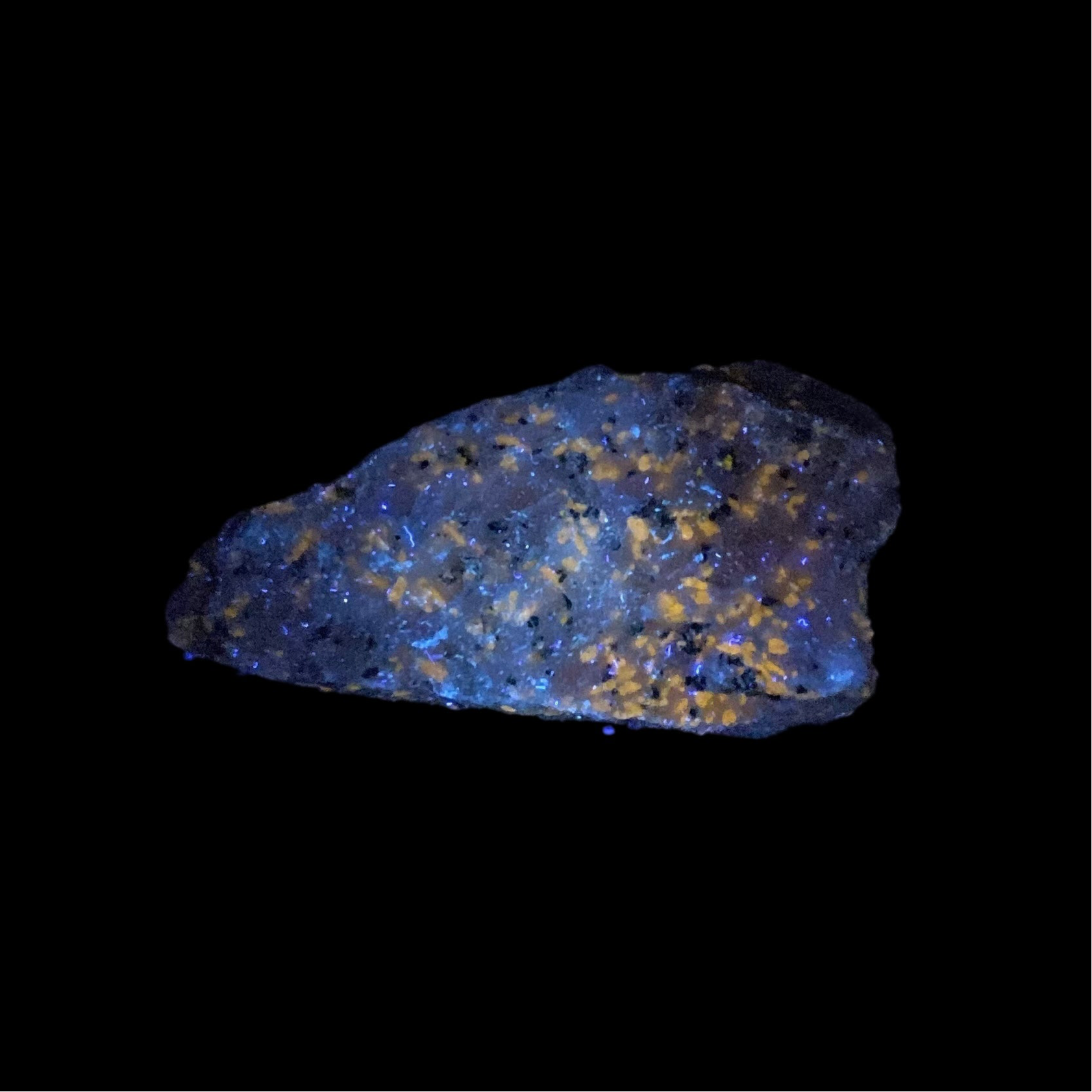 Fluorescent Wollastonite on Calcite, Nobel Pit, Sterling Hill Mine, New Jersey