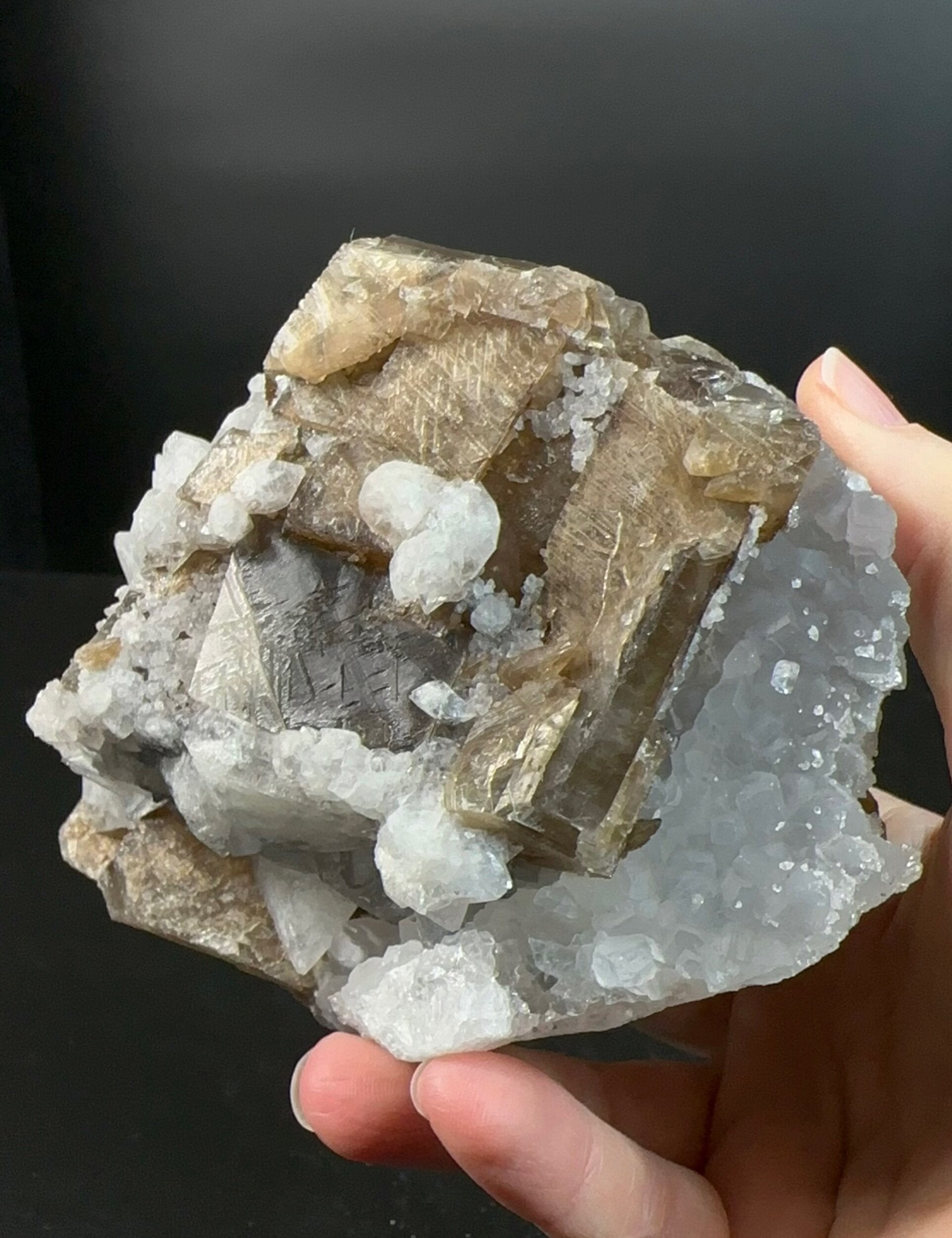 Brown Rhombohedral Calcite Crystals with Intergrown Clear Apophyllite and Fluroescent Powellite in Basalt Pocket