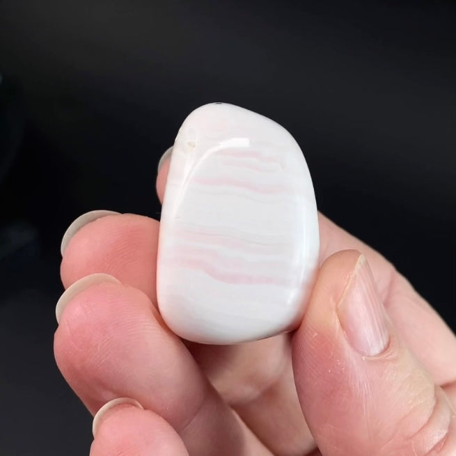 High Grade Light Pink Mangano Calcite Tumbled Stone from Peru, Fluorescent