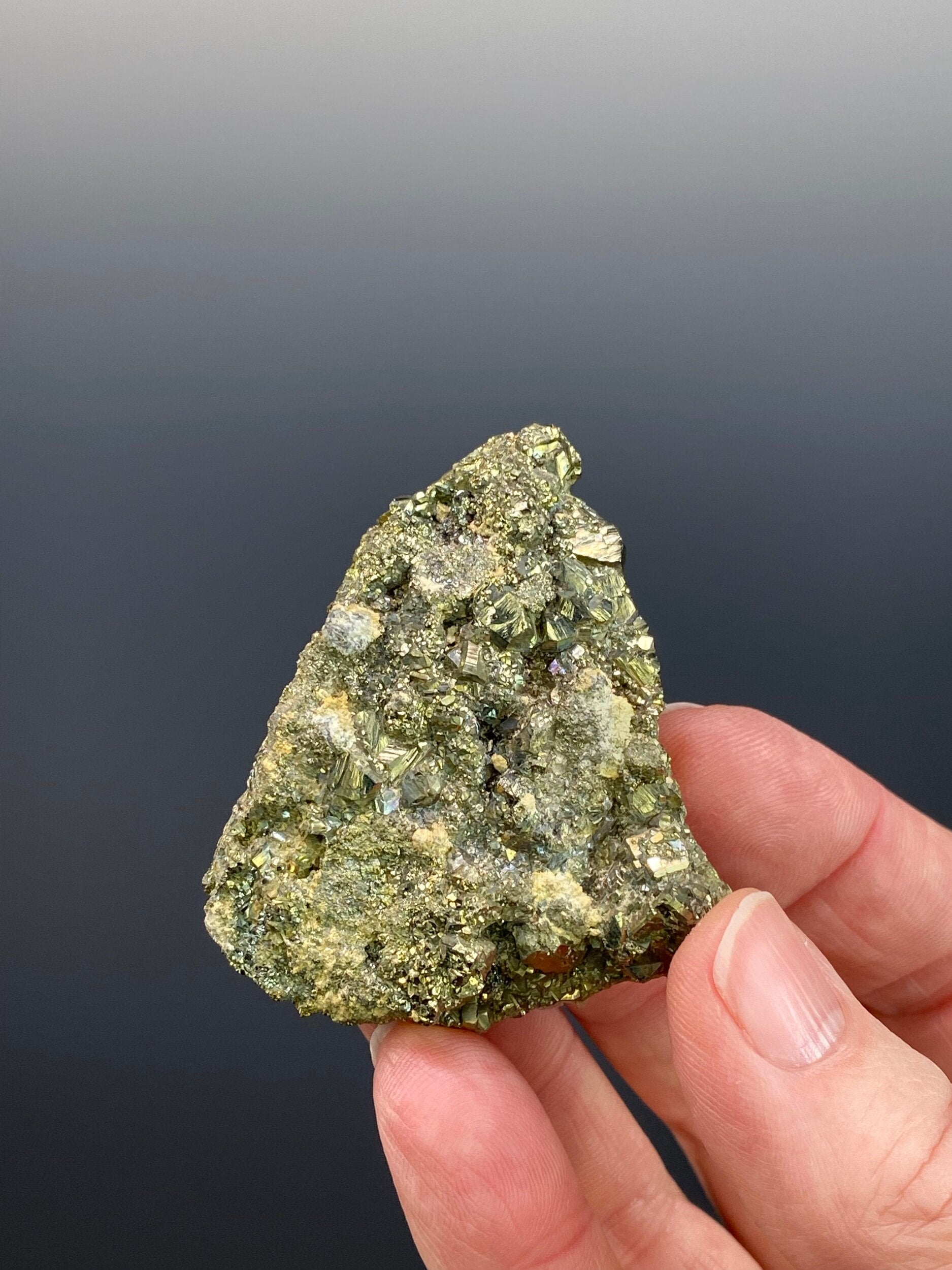 Cubic Pyrite Cluster with Fluorescent Calcite Crystals