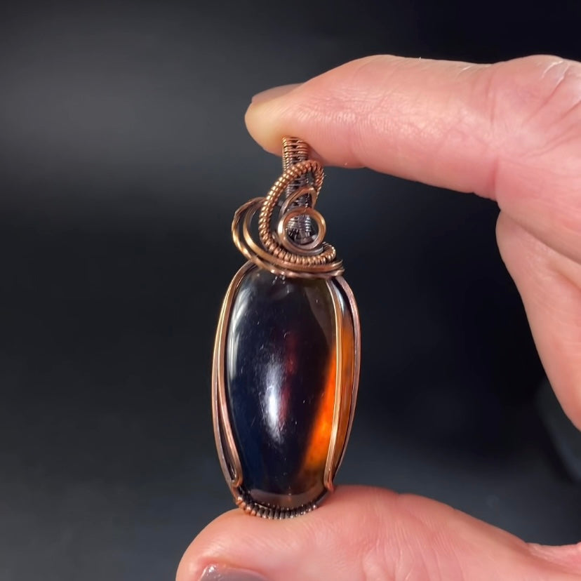 Blue Sumatran Amber and Copper Wire Wrapped Pendant