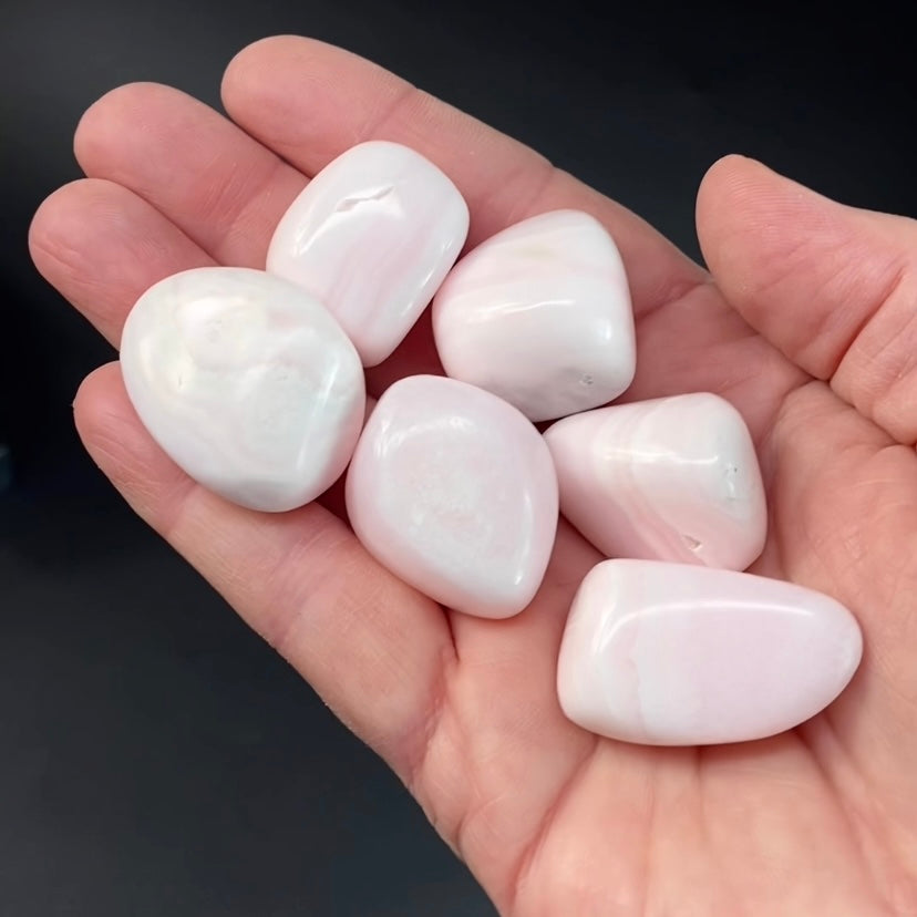 High Grade Light Pink Mangano Calcite Tumbled Stone from Peru, Fluorescent
