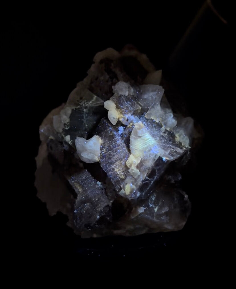 Brown Rhombohedral Calcite Crystals with Intergrown Clear Apophyllite and Fluroescent Powellite in Basalt Pocket