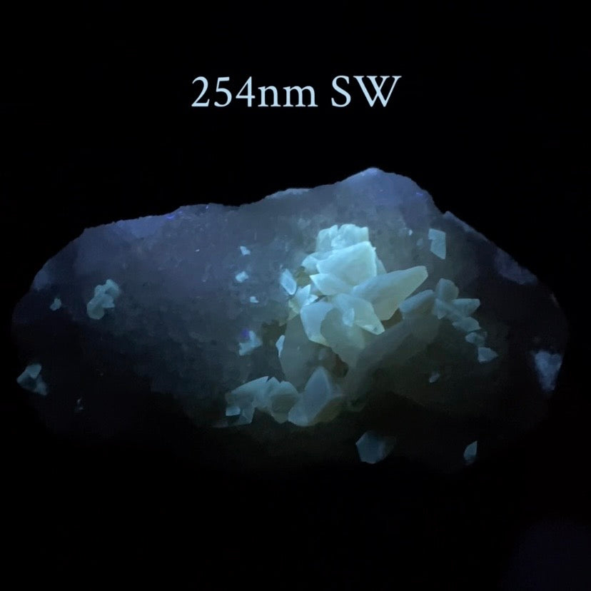 Phosphorescent Golden Honey Calcite Crystals on Druzy Quartz in Basalt Pocket