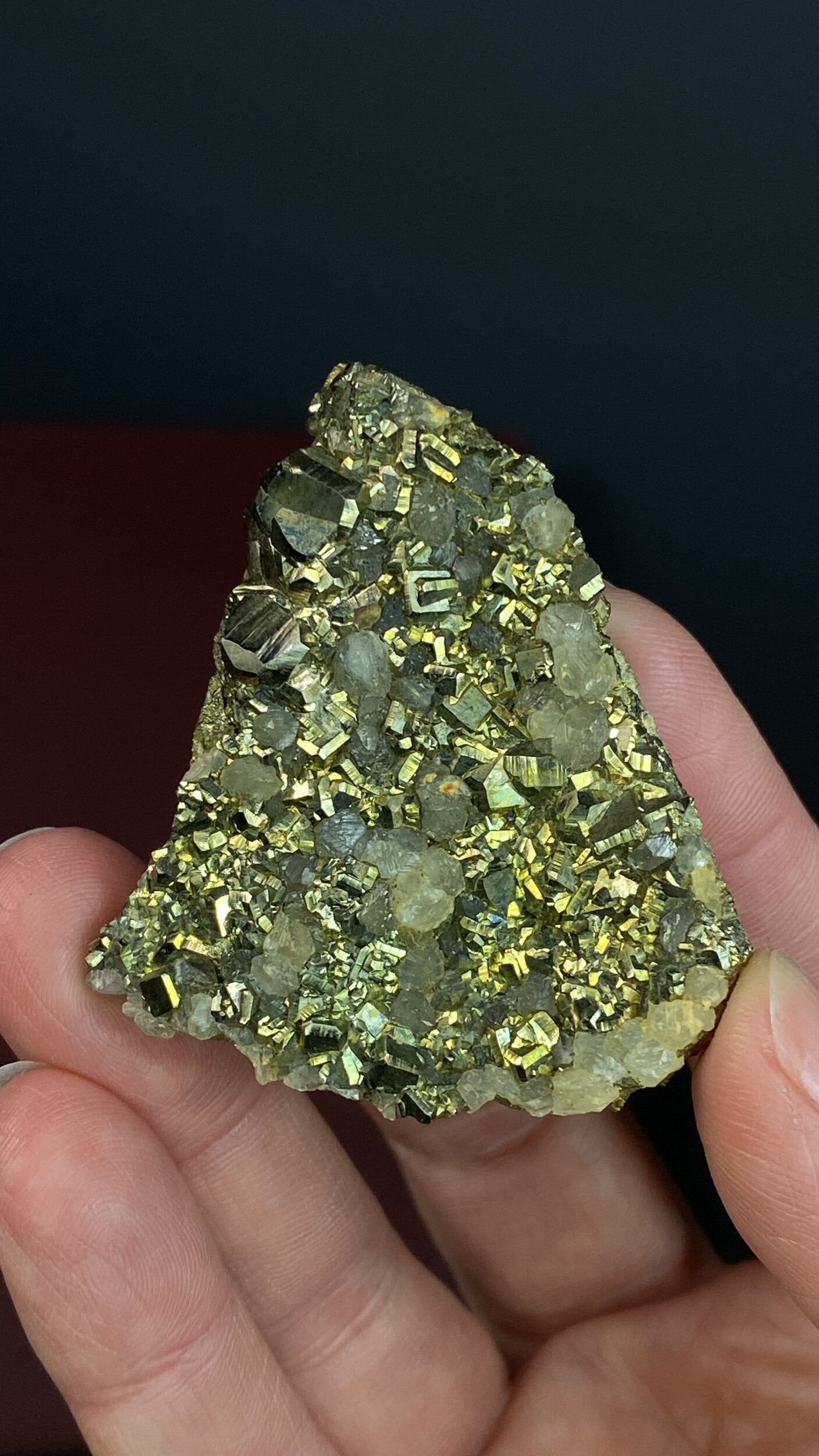 Cubic Pyrite Cluster with Fluorescent Calcite Crystals