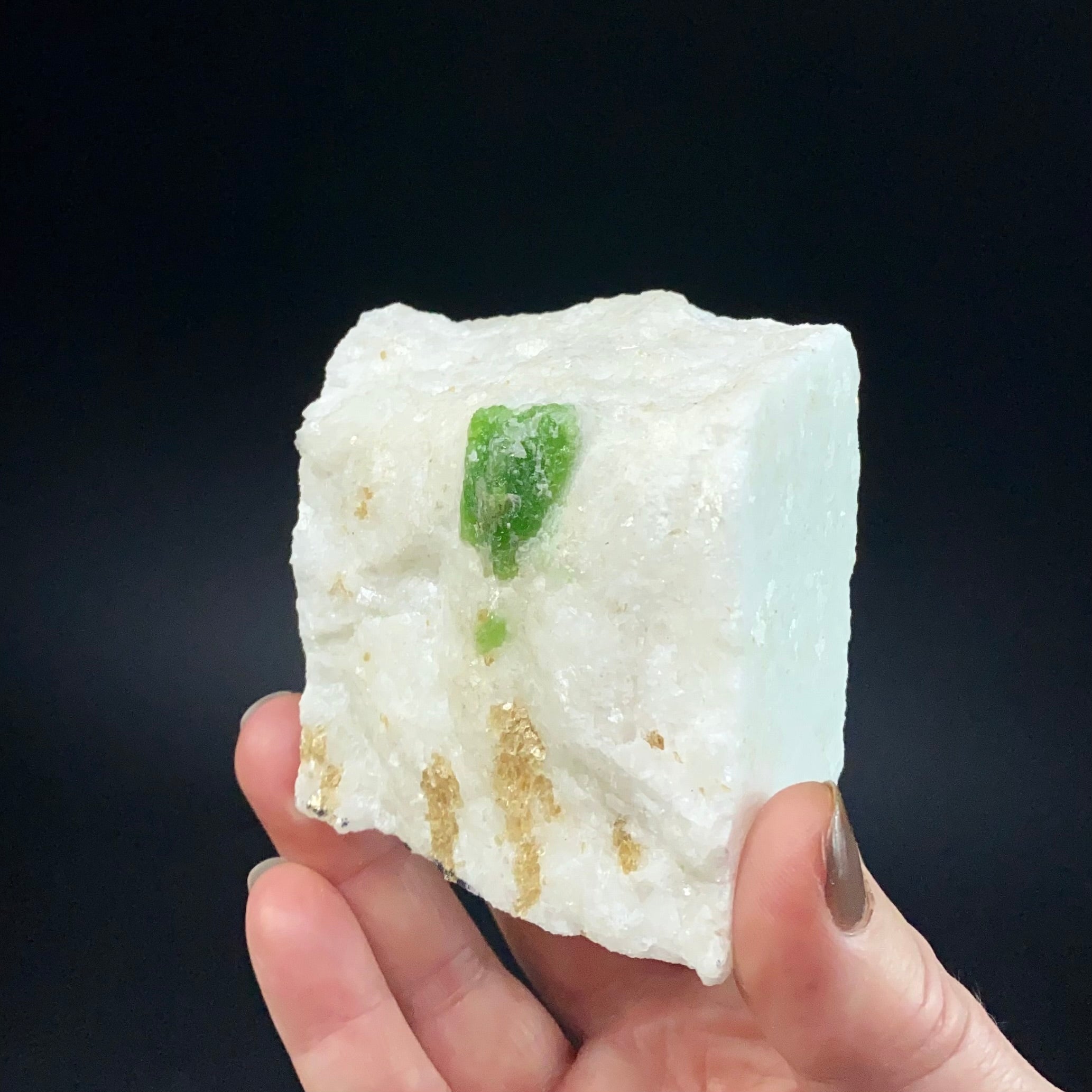 Green Pargasite Crystals with Phlogopite on Marble Matrix