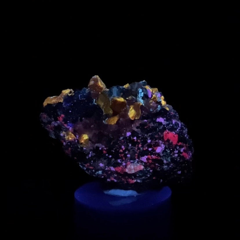 Zircon Crystal with Fluorescent Apatite Inclusions, Biotite-Calcite Aegirine matrix, Astore Valley, Pakistan