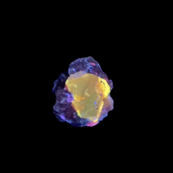 Zircon Crystal with Bright Yellow Fluorescent Apatite Inclusions on Matrix