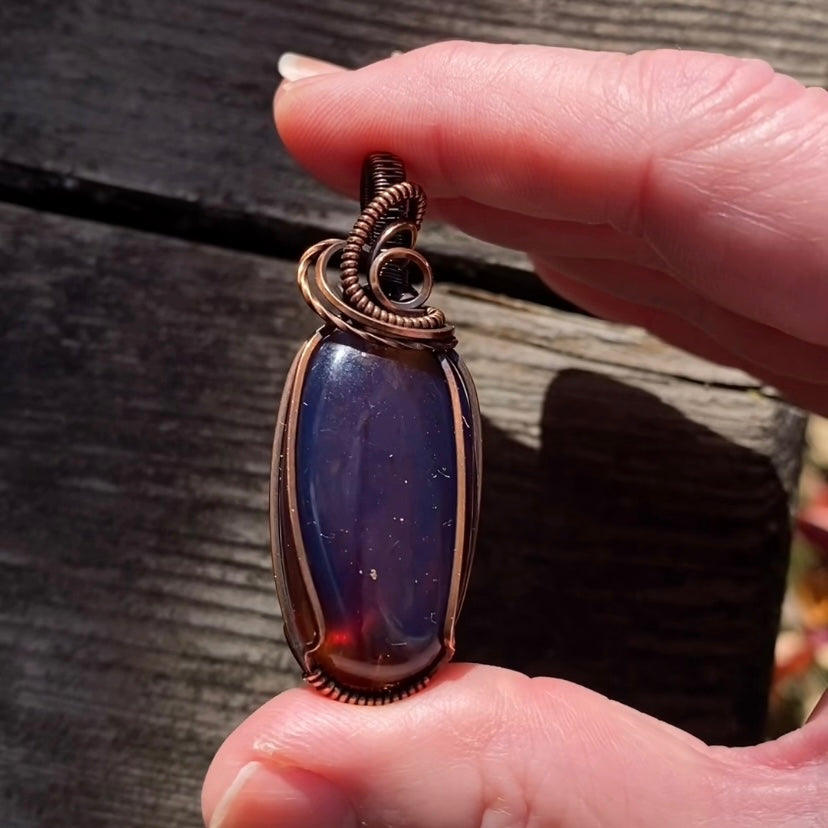 Blue Sumatran Amber and Copper Wire Wrapped Pendant