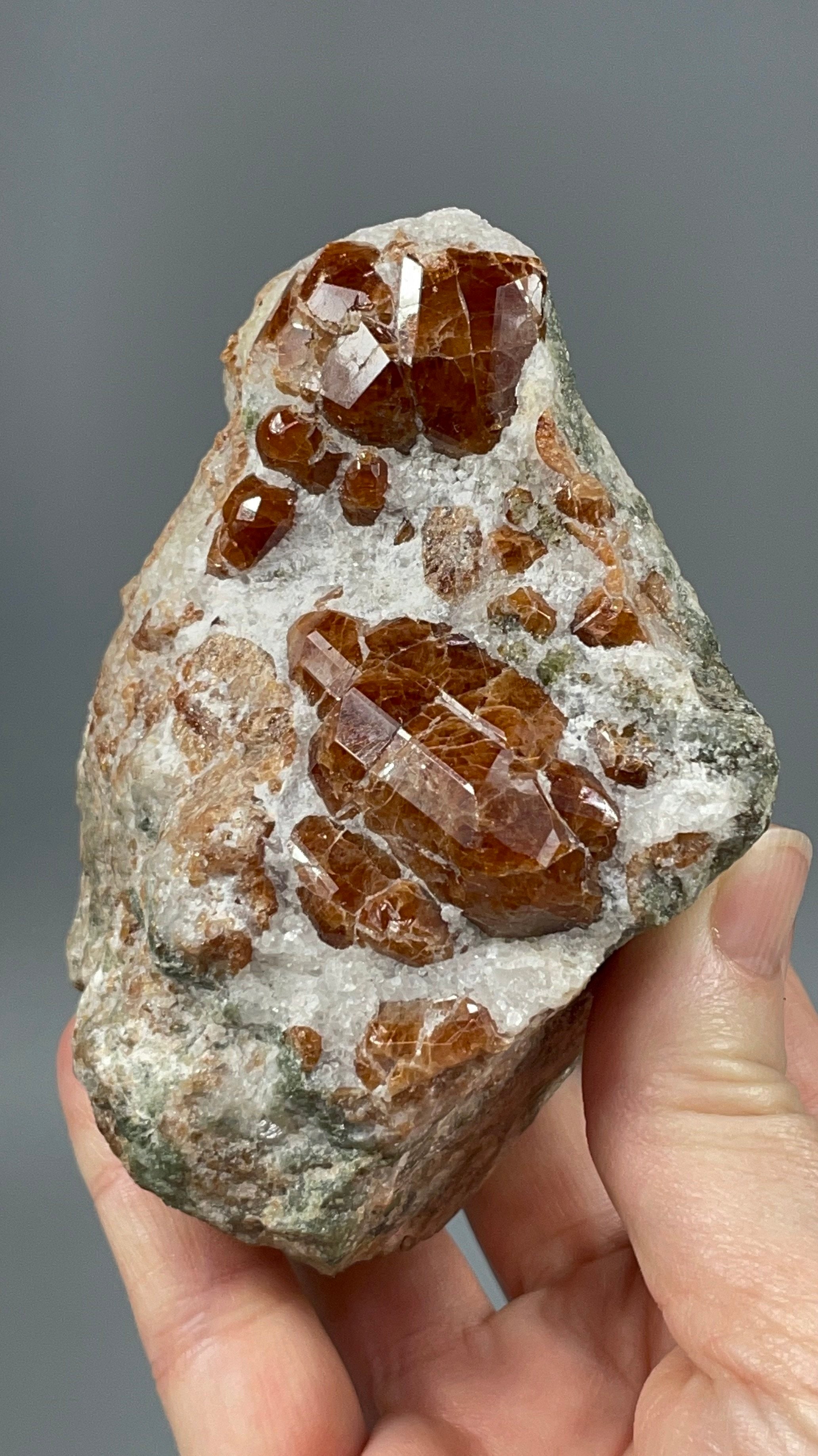 Orange Garnets on Matrix