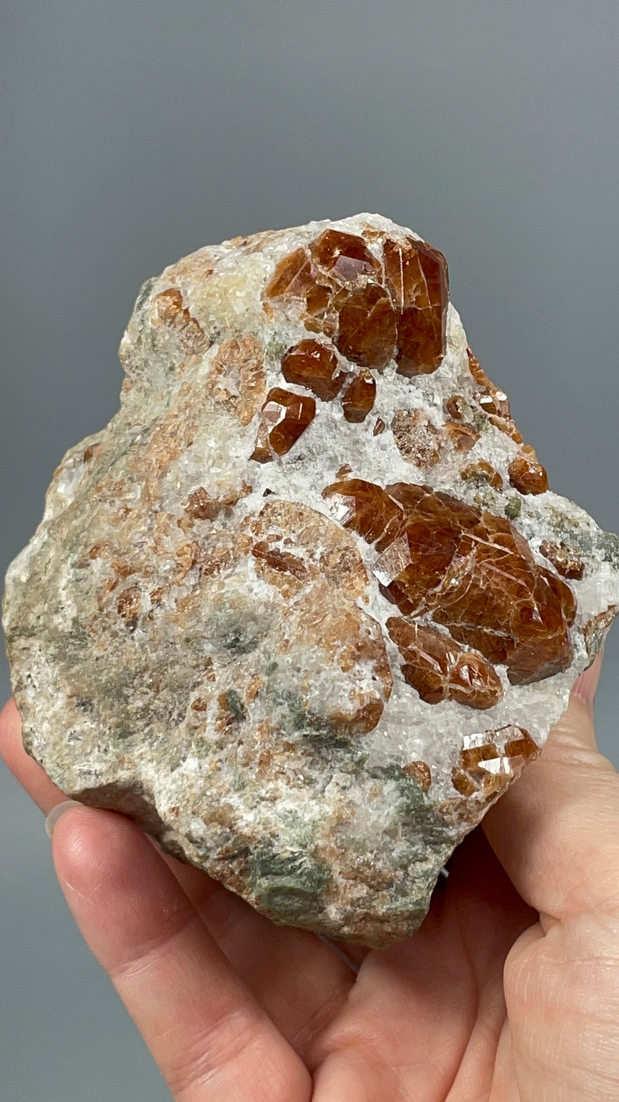 Orange Garnets on Matrix